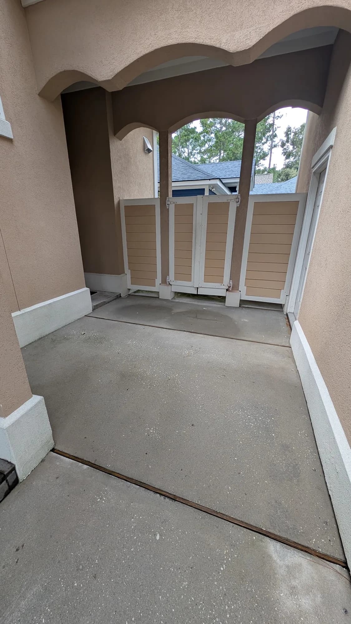 The same porch landing light and clean after pressure washing