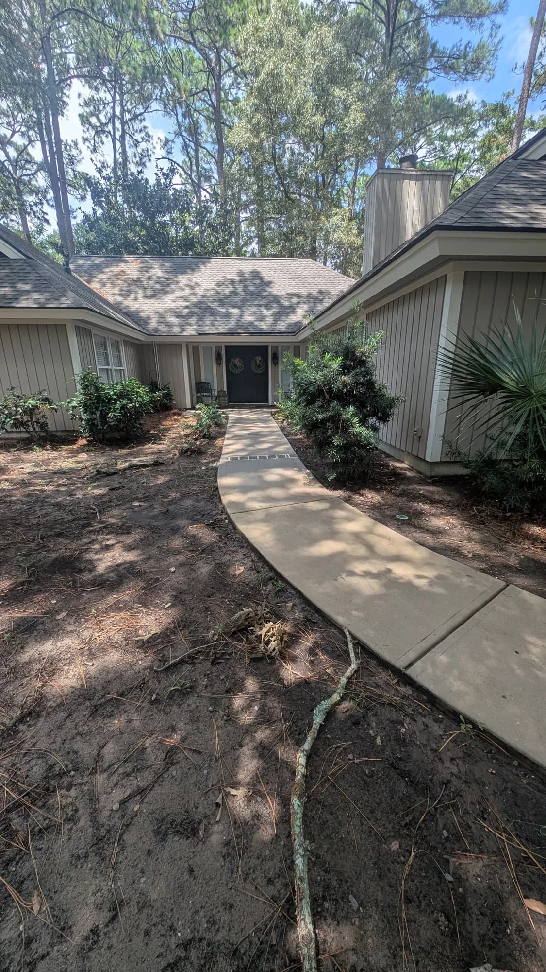 The same front walkway clean and bright after pressure washing