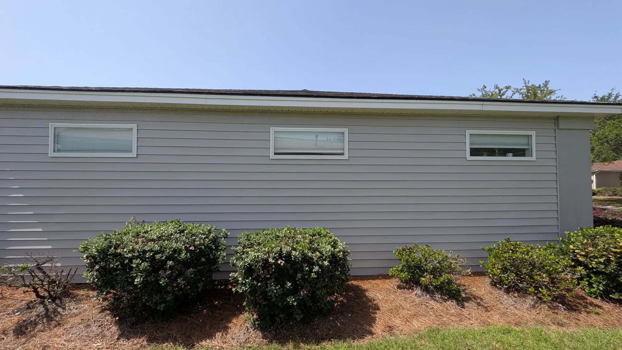 The same siding wall even and bright after washing