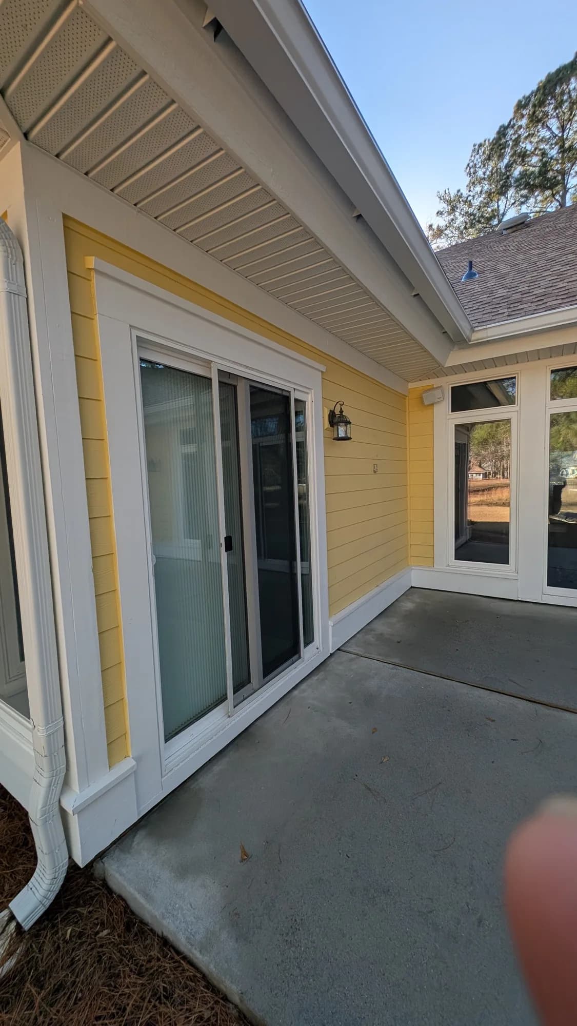 The same patio and slider surround clean and bright after washing